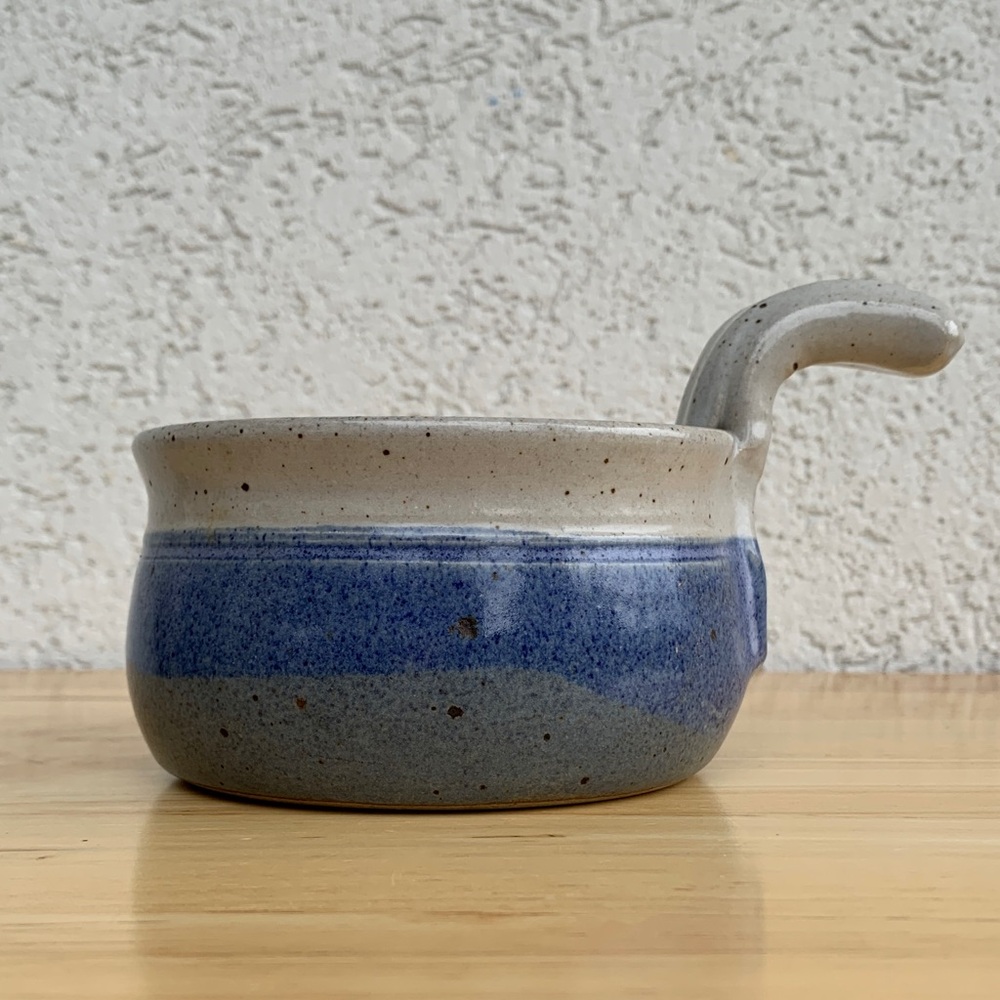 Handcrafted signed small pottery bowl with handle Blues and grey specked glaze
